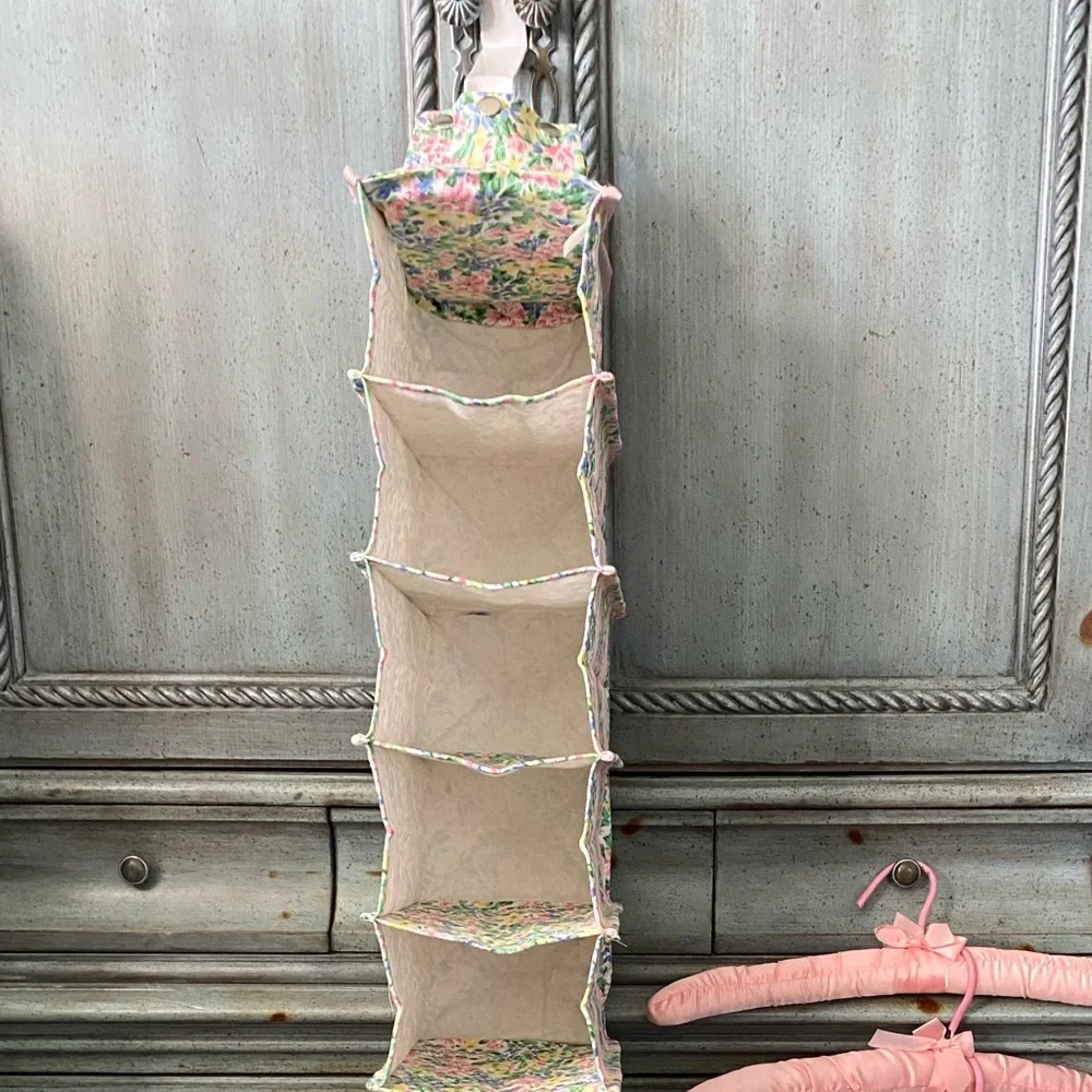 3 pink padded hangers & 1 closet “shoe” caddy (holds 8 pr of shoes, or whatever)